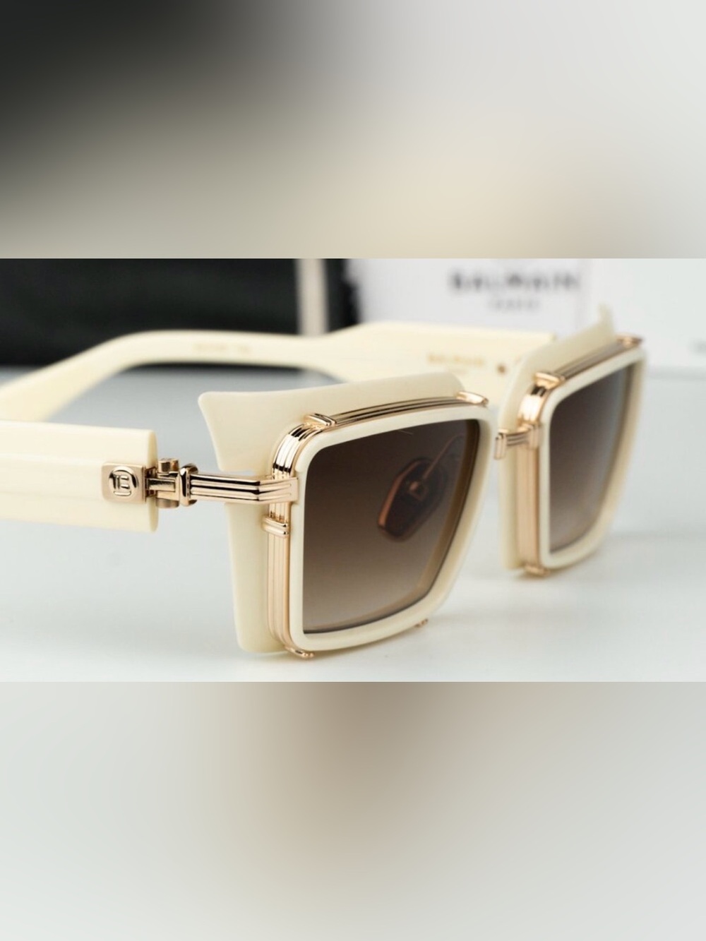 Balmain Cream Frame Sunglasses with Gold Accents